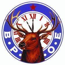 A logo featuring a brown elk with large antlers in front of a clock with Roman numerals. The letters B.P.O.E. are arranged in a blue circle around the elk's head, featuring a kodiak theme and a red star at the top.