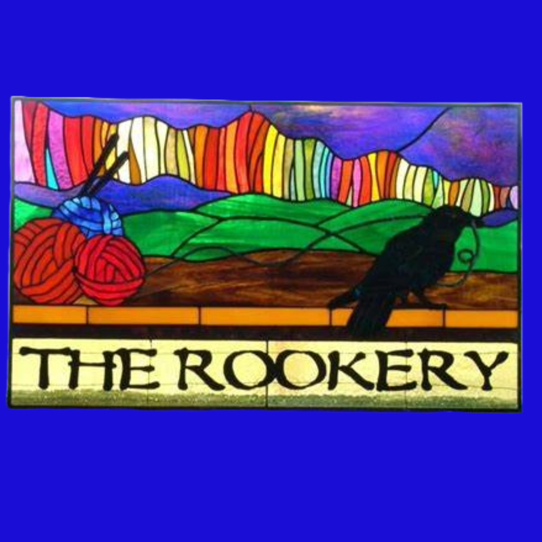 "The Rookery" stained glass image with raven and yarnd