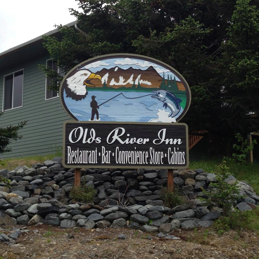 "Olds River Inn; Restaurant Bar Convenience Store Cabins"