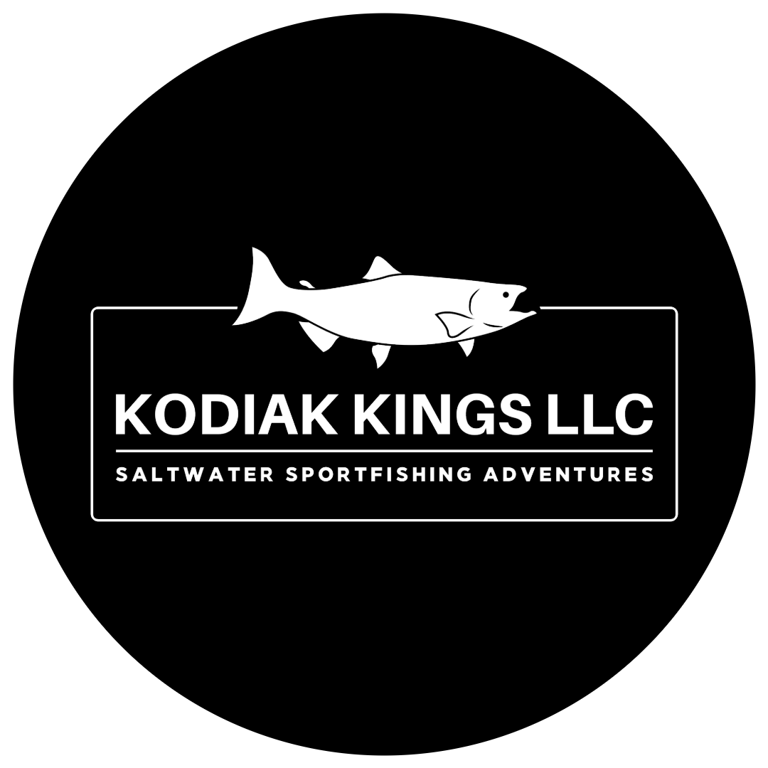 A circular black logo featuring a white fish illustration above the bold text KODIAK KINGS LLC, with Saltwater Sportfishing Adventures in capital letters below, capturing the spirit of Kodiak’s fishing heritage.