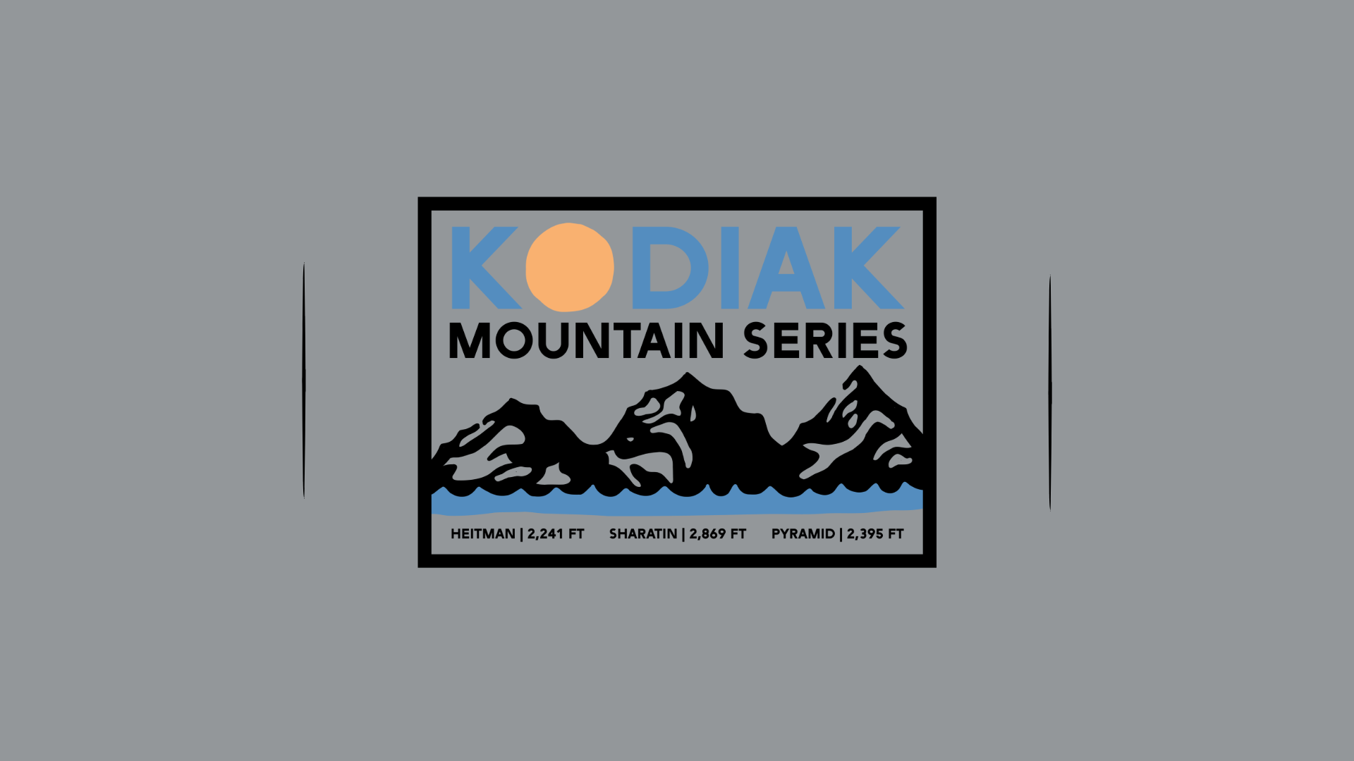 A rectangular Kodiak Mountain Series logo features three black mountain peaks, a yellow sun, and blue sky. Text at the bottom lists Hetman 2,241 ft, Sharatin 2,689 ft, and Pyramid 2,395 ft.