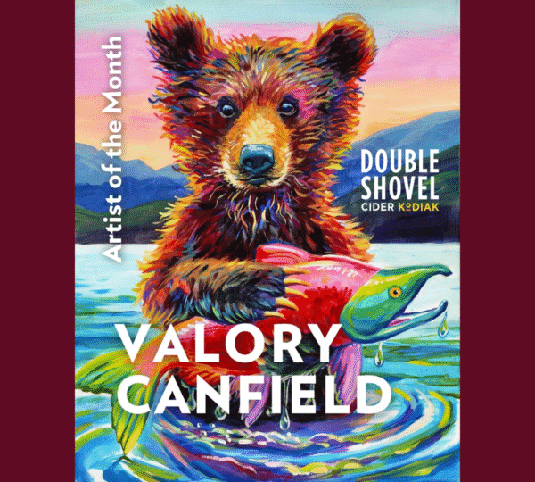 A colorful painting of a bear standing in water holding a large fish, with text reading Artist of the Month, Double Shovel Cider Kodiak, Live Painting Event Kodiak Alaska – Valory Canfield overlaid on the image.