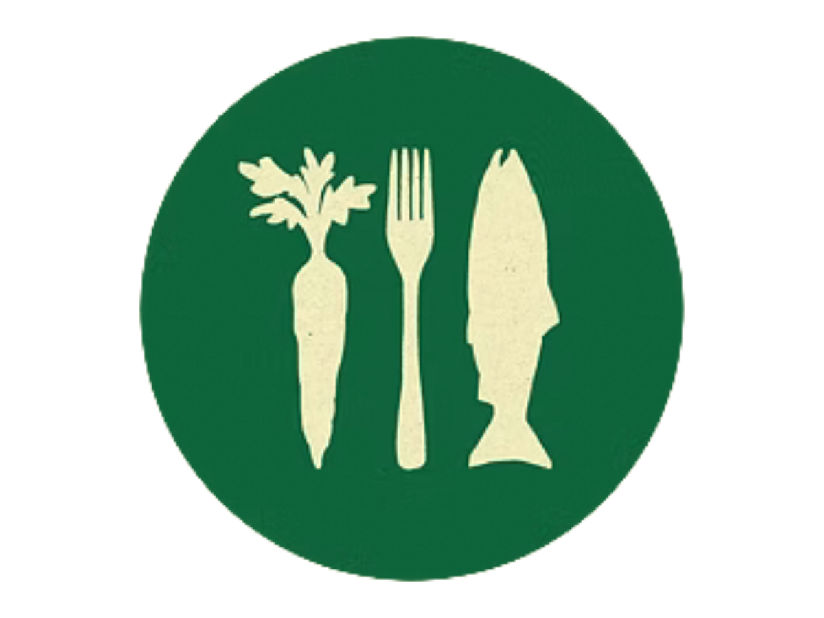A green circle with cream-colored silhouettes of a carrot, a fork, and a fish placed side by side, representing Kodiak Harvest Food Co-op’s diverse offerings.